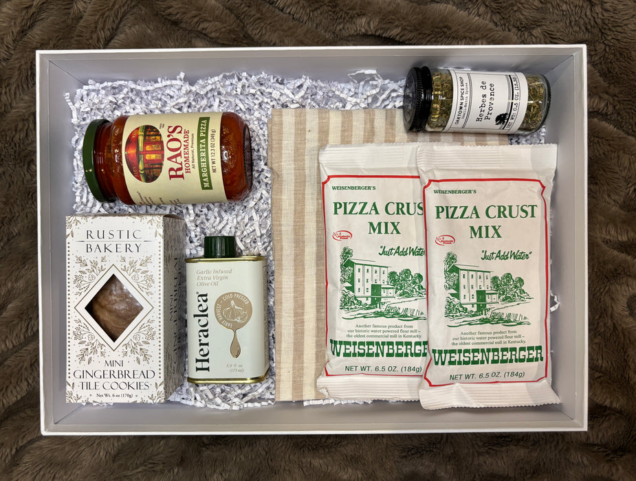 Gourmet pizza-making gift set featuring sauce, crust mixes, olive oil, herbs, and cookies in a neatly packed gift box.